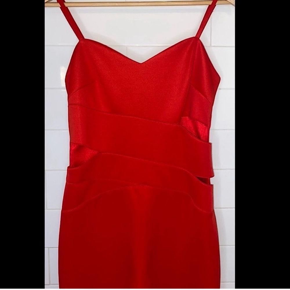 Red Bebe jumpsuit.